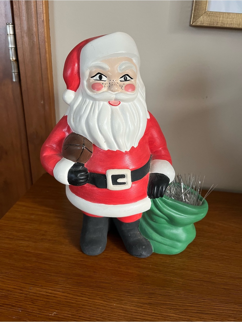 Festive Red Santa Claus Holiday Figurine with Green Sack
